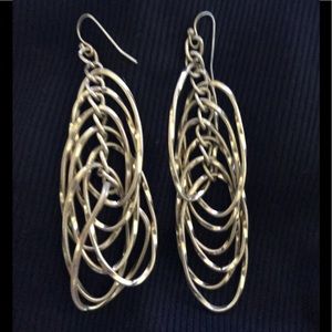 Gold plates fish tale like earrings